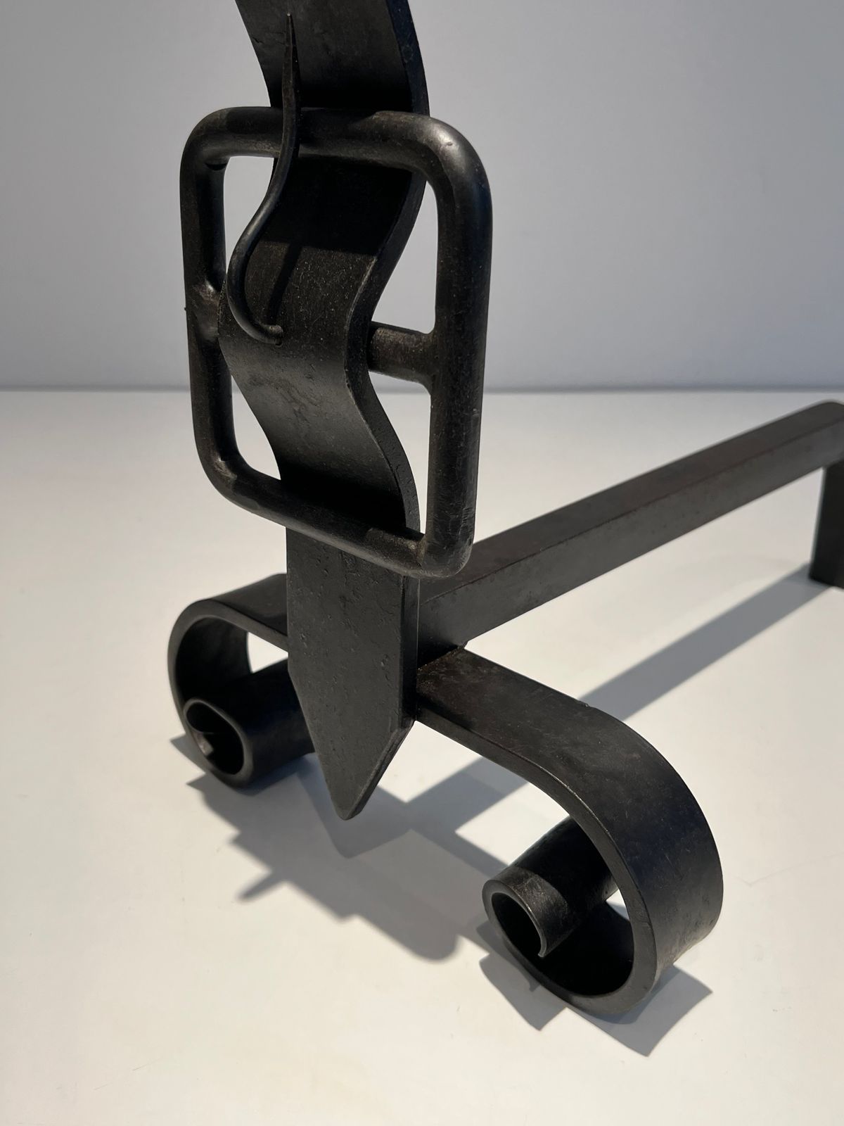 photo for sale Pair Of Modernist Andirons Representing A Belt