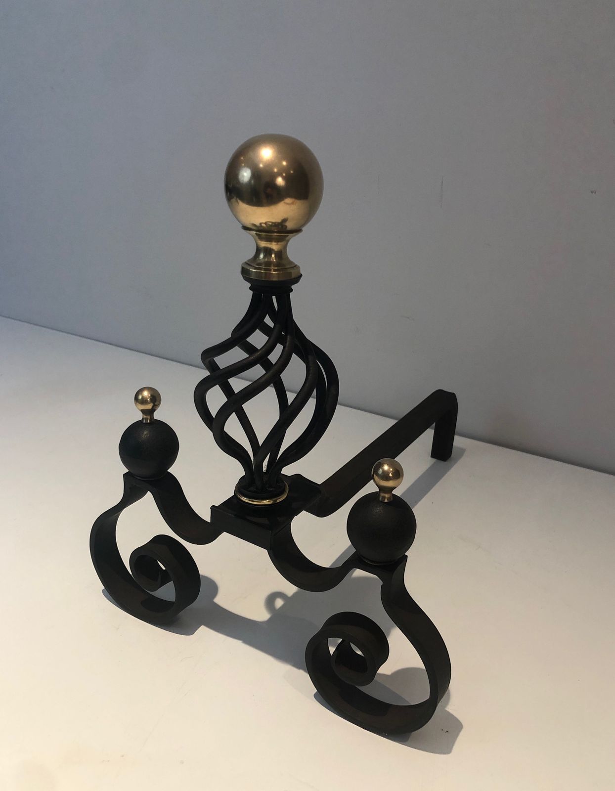 Pair Of Wrought Iron Andirons Topped With A Brass Ball photo buy