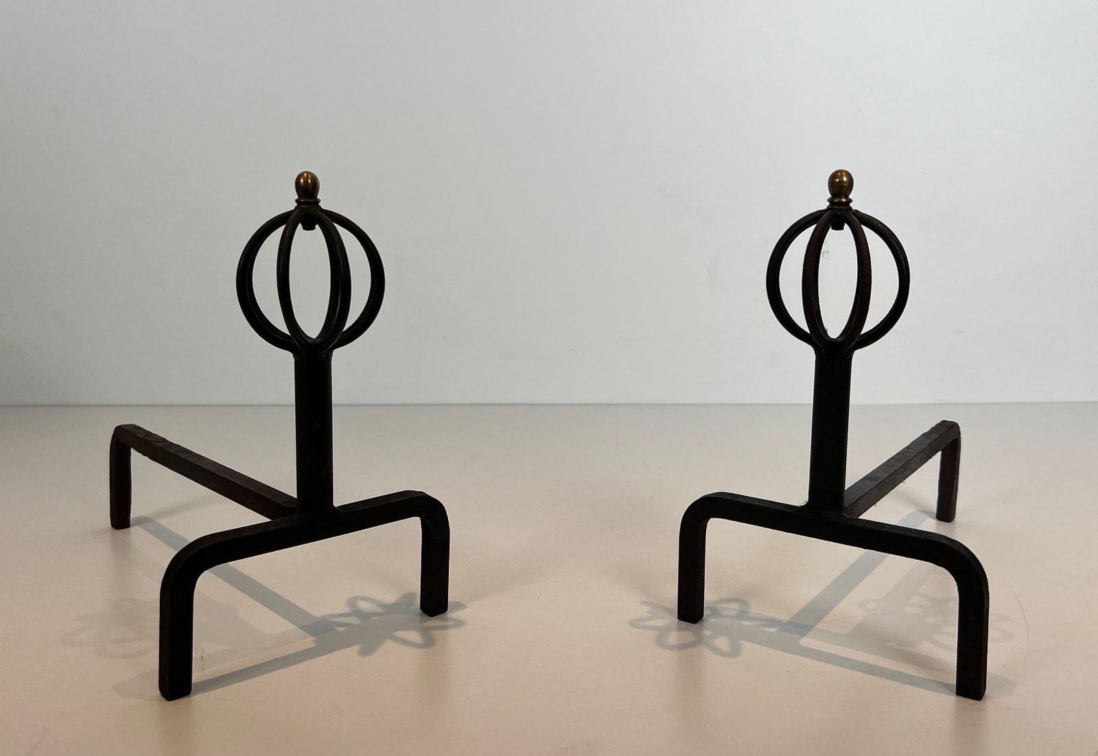 Pair Of Wrought Iron Andirons In The Taste Of Jean Royère photo for sale