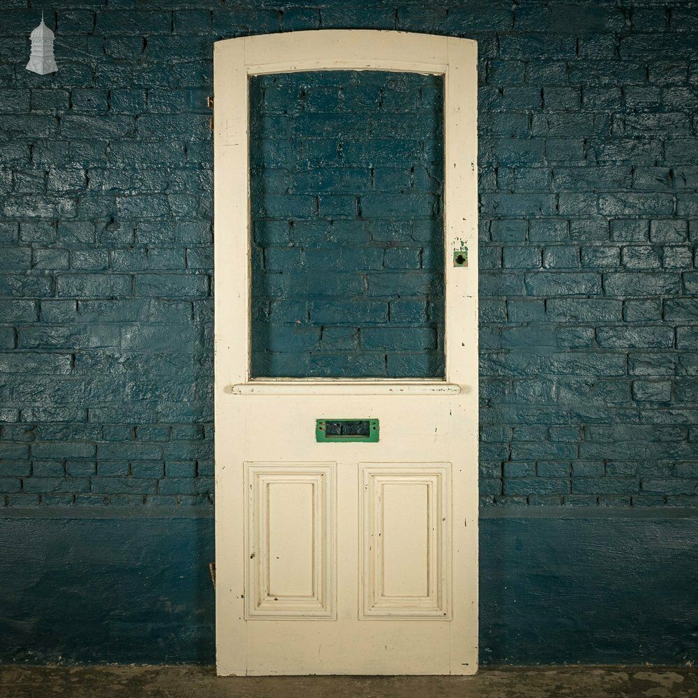 Half Glazed Door, Arched Top And White Painted Finish