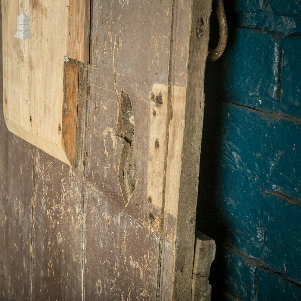 photo vintage Hardwood Barn Door, 18th C Braced And Ledged With Period Repair And Distressed Brown Paint Finish