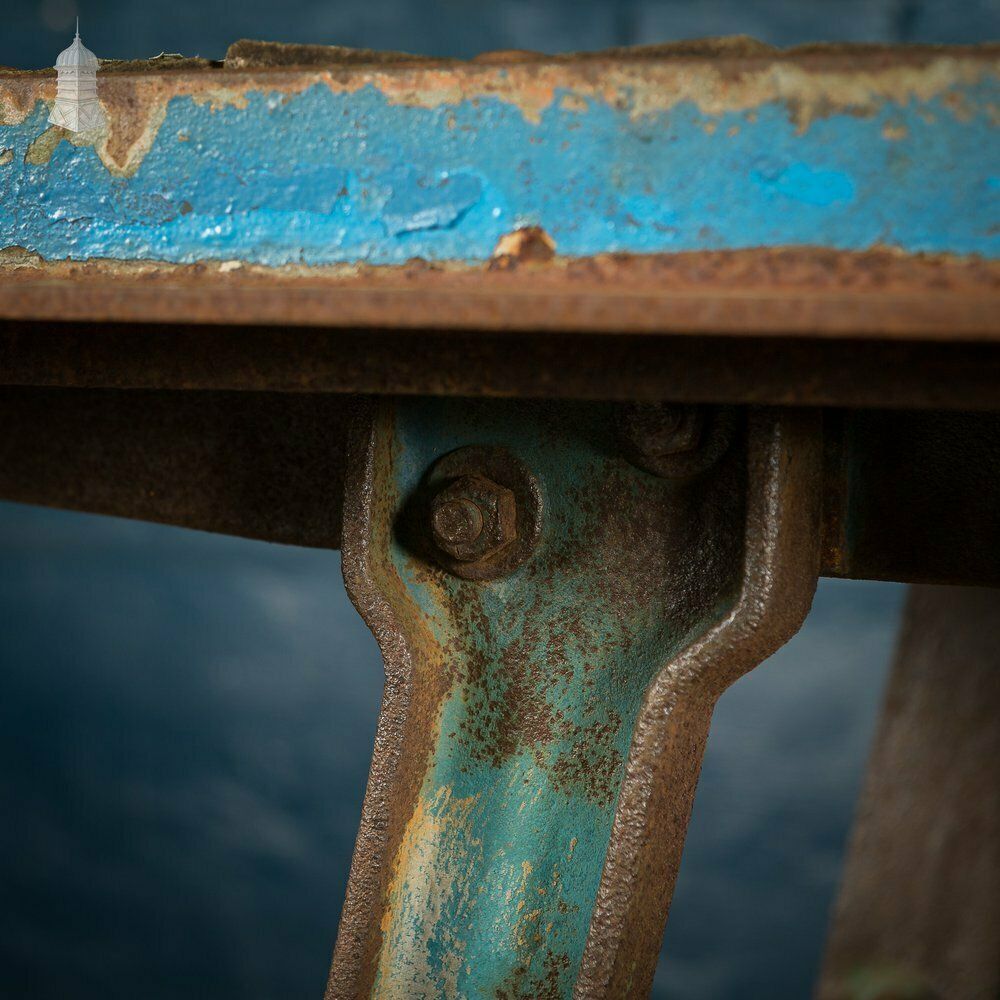 photo furniture Cast Iron Industrial Base With Steel And Timber Top