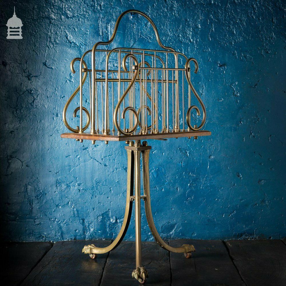 630.0 19th C Brass And Oak Swivel Sheet Music Or Record Rack With Claw Feet, Ceramic Castor’s And Treble Clef Design photo