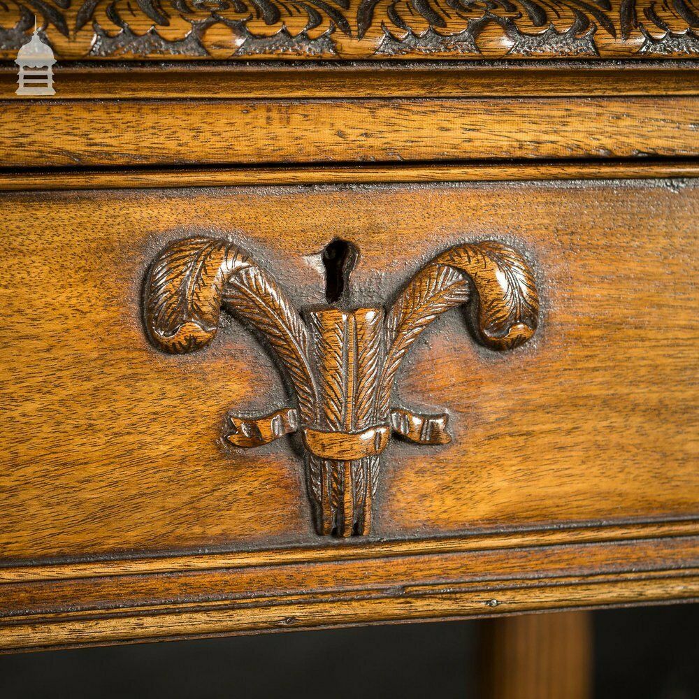 photo furniture A Fine Late 19th C Sheraton Style Writing Table With Carved Prince Of Wales Feathers Escutcheons And Elegant Mellon Fluted Legs.