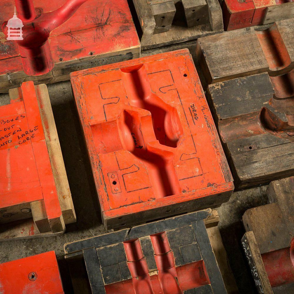 Collection Of 28 Red And Black Industrial Foundry Factory Moulds photo furniture