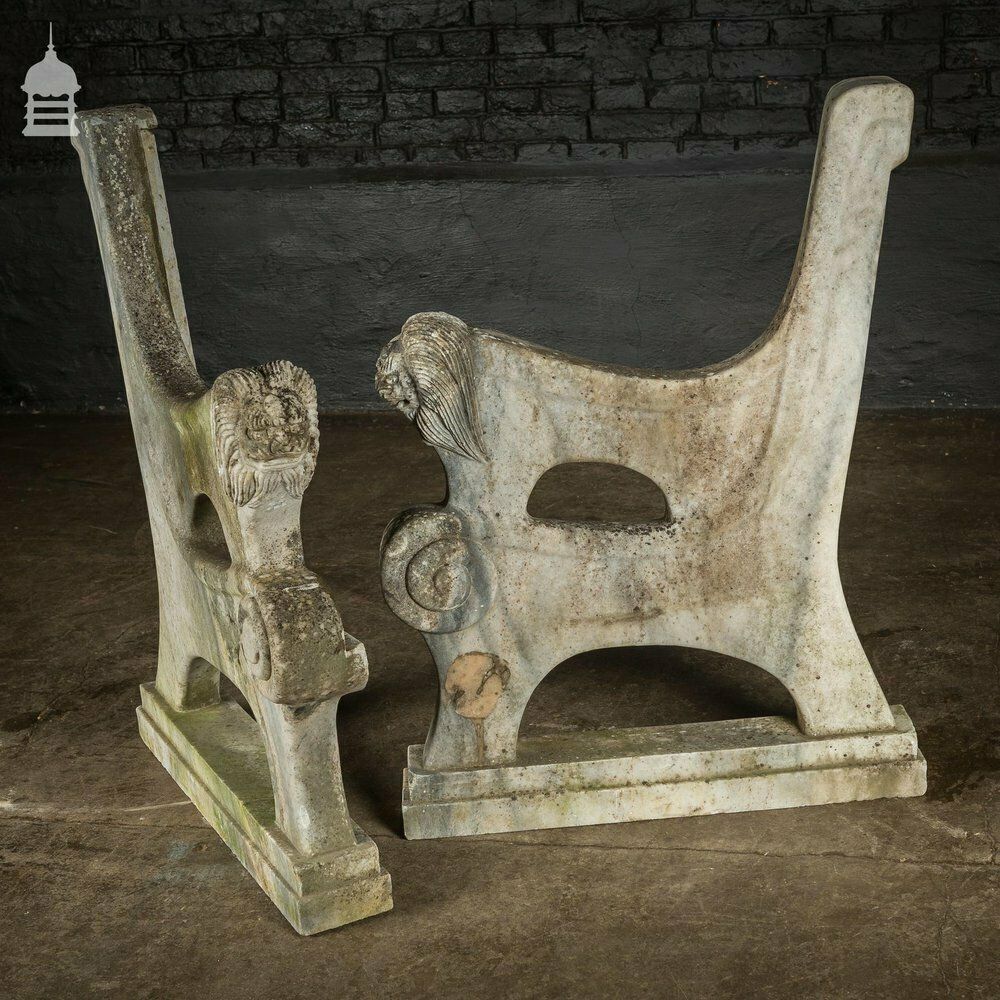 photo for sale Pair Of Weathered Marble Bench Ends With Carved Dragon Design