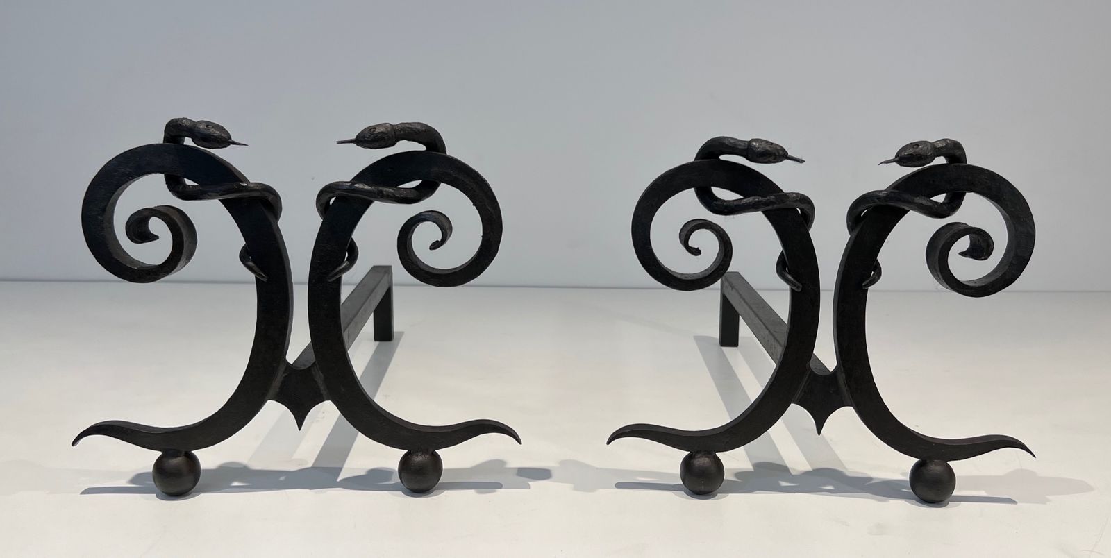 Pair Of Wrought Iron Andirons "With Snakes" In The Taste Of Edgar Brandt photo for sale