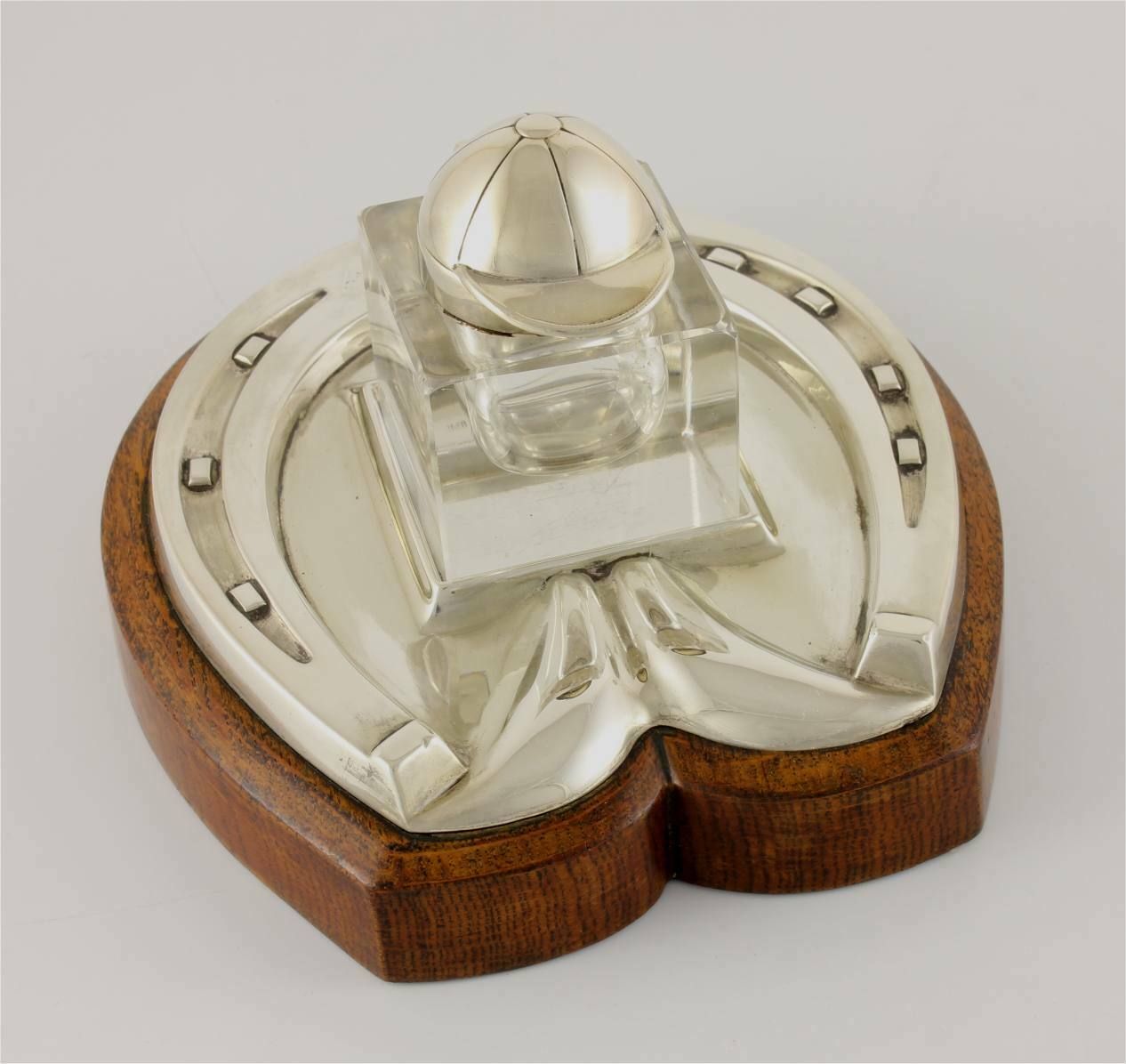 Silver Plate & Oak Horseshoe With Jockey Cap Glass Inkwell Desk Stand.