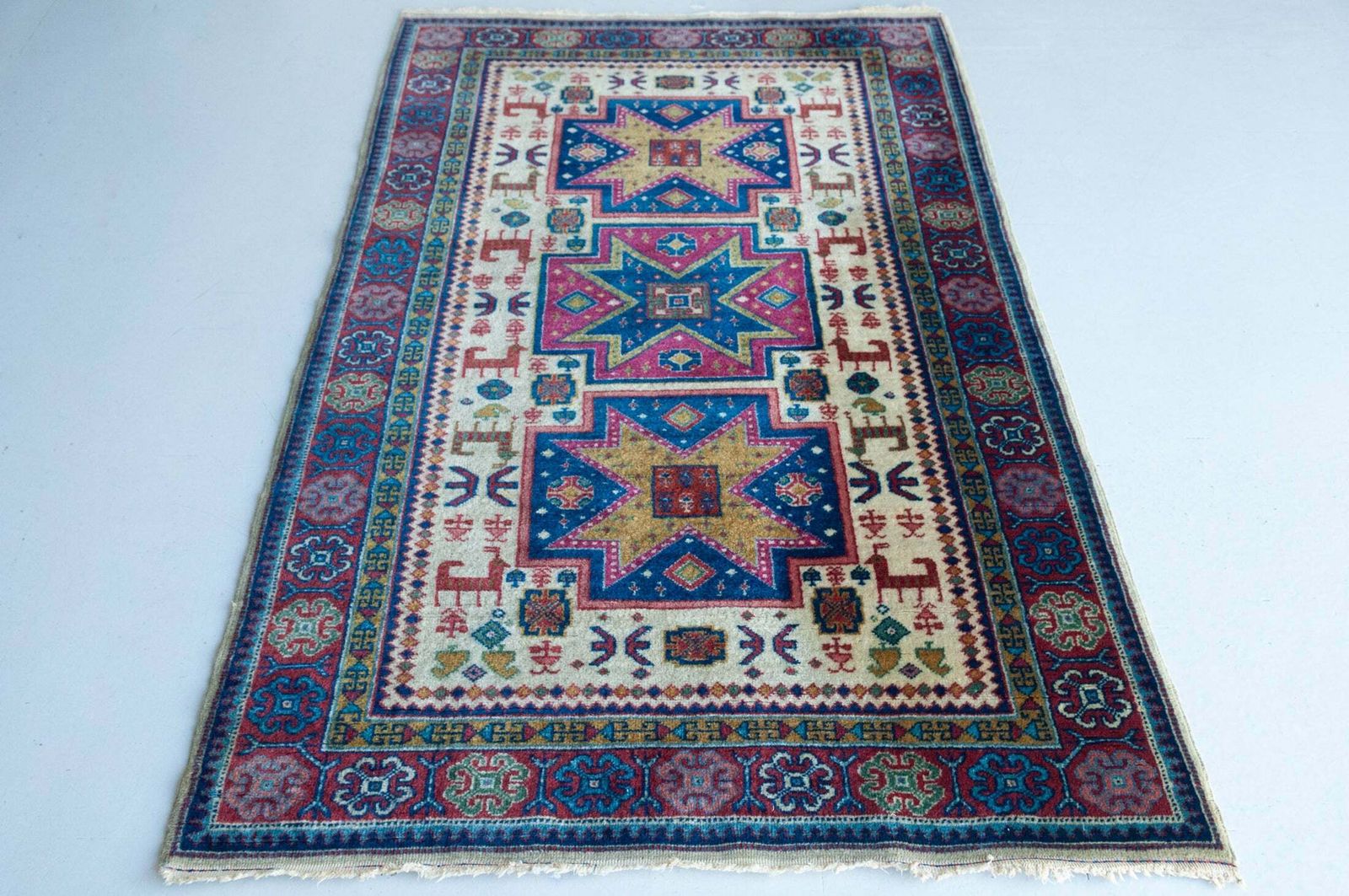 Hand Woven Vintage Eastern Rug With Animal Motifs photo furniture