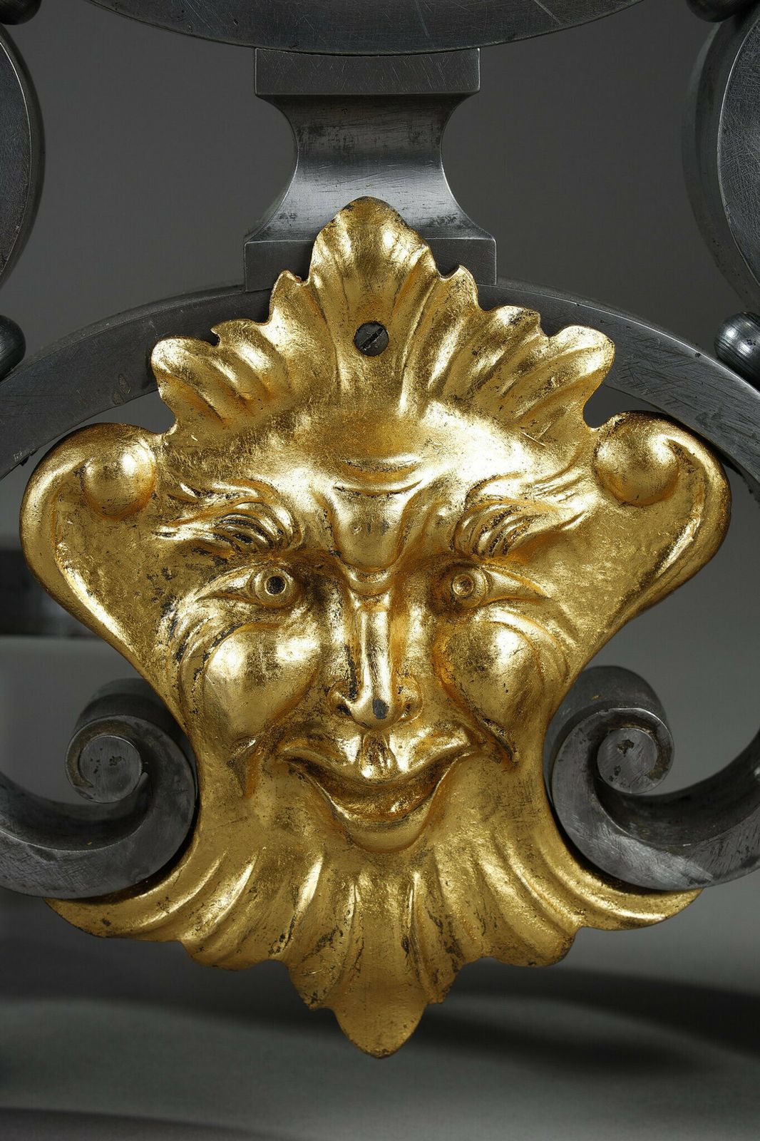 photo vintage Pair Of Wrought Iron Landiers With Foliage, Mask And Scroll Decoration