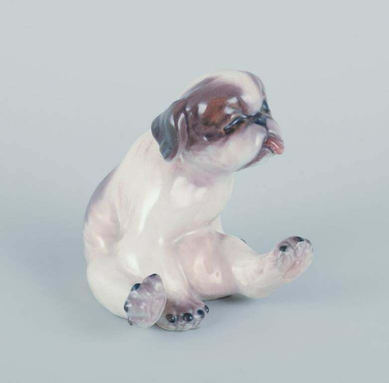 Dahl Jensen, Porcelain Figurine Of A Pekingese Puppy. photo furniture