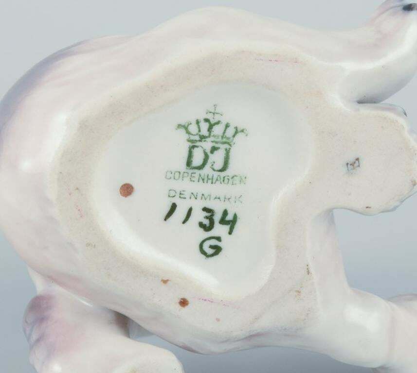 Dahl Jensen, Porcelain Figurine Of A Pekingese Puppy. photo vinterior