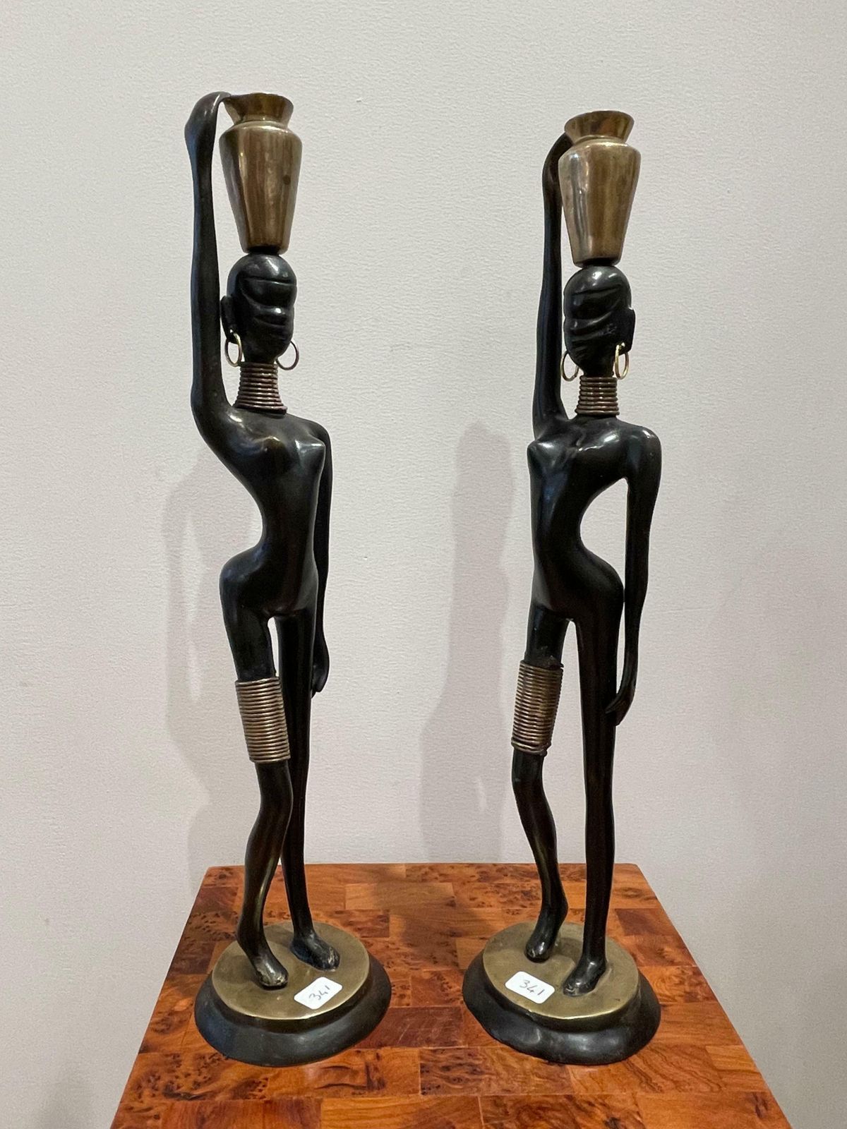A Pair Of Women Carrying Water, In The Style Of Hagenauer photo furniture