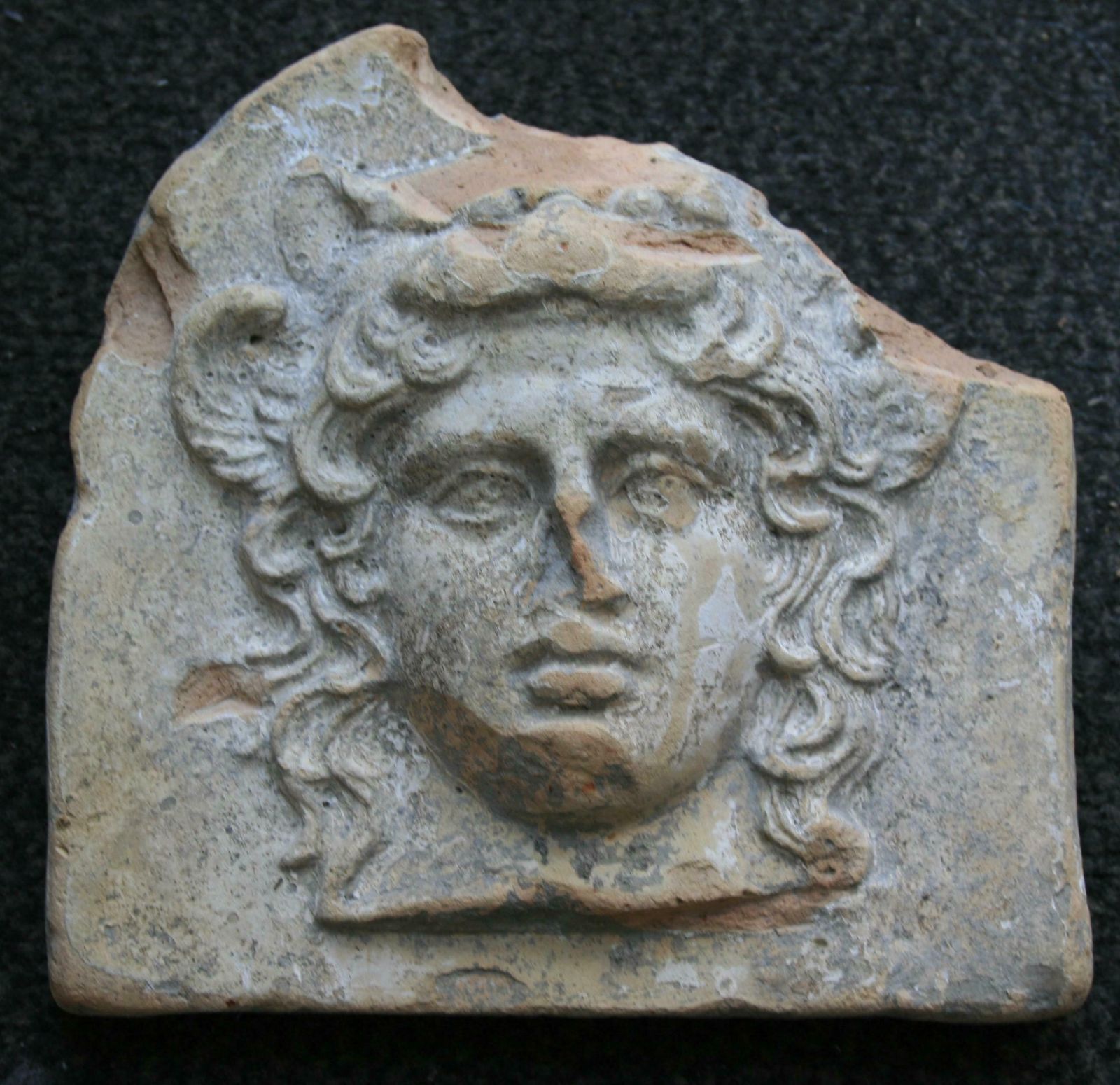 Ancient Greek Terracotta Antefix In Form Of The Head Of Artemis Bendis, Taranto photo furniture