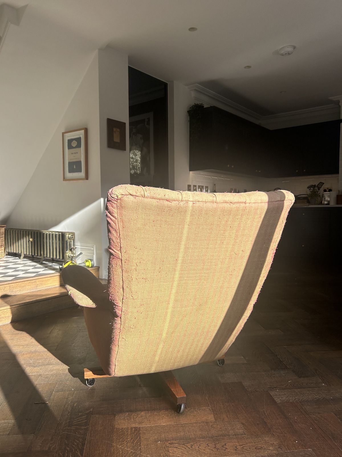 Swivel Wing Chair With A Textured Fabric In Burnt Amber Colour photo for sale