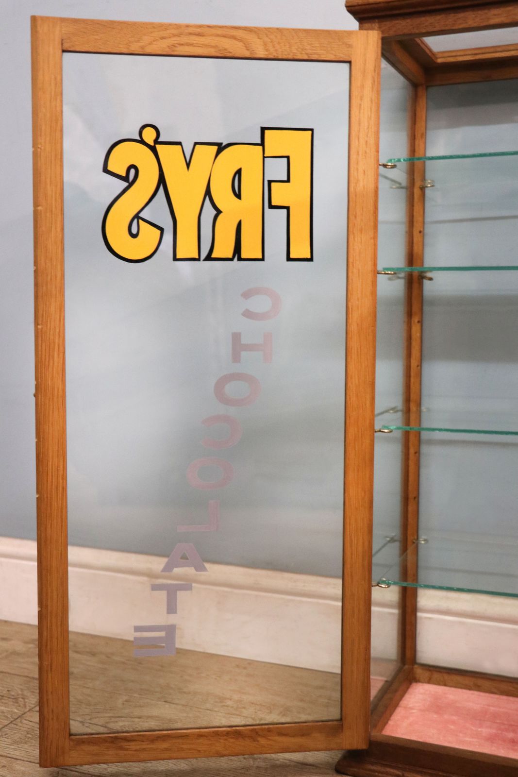1145.0 A Lovely Pair Of Early 20th Century Counter Display Cabinets Later Sign Written For Frys Chocolate. photo