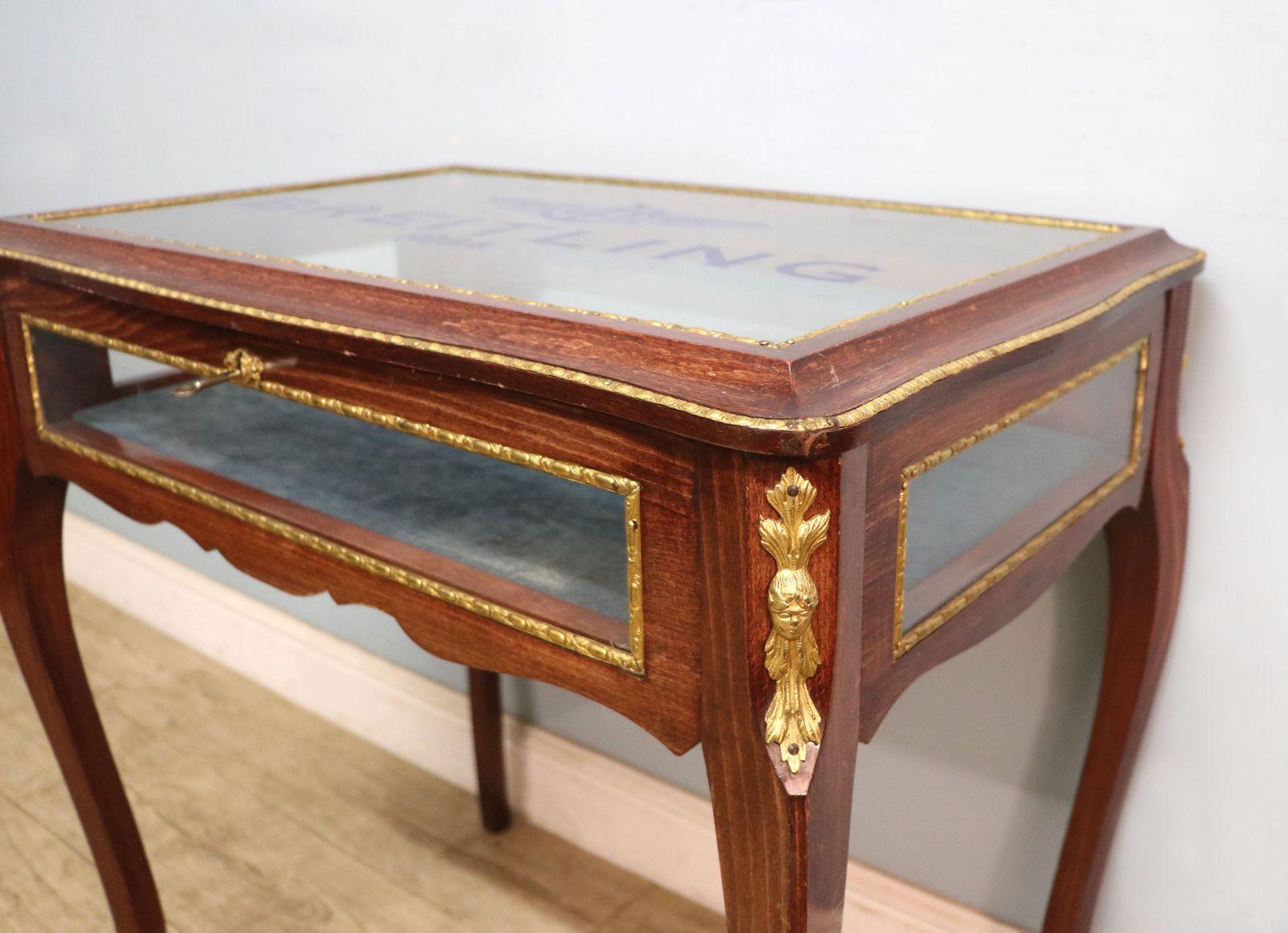 A Lovely 20th Century French Hardwood Bijouterie Display Table Later Sign Written For Breitling Watches. photo buy