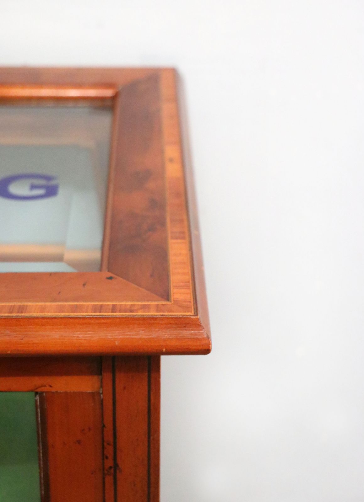 A Lovely Yew Wood Veneered Bijouterie Display Table, Later Sign Written For Breitling Watches. photo buy