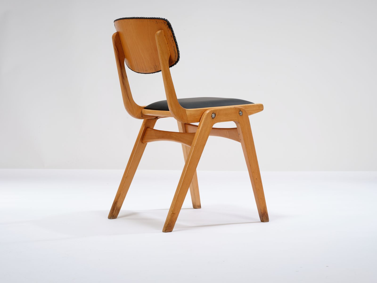 photo furniture Vintage Stackable Beech 'Ben Cafe Chair' Reupholstered In Soft Expresso Leather With Stud Detailing, Circa 1960's, 8 Available.