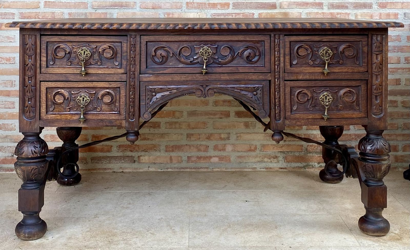 Furniture 19th Century French Renaissance Hand Carved Desk Or Writing Table With Carved Structure And Iron Stretcher photo