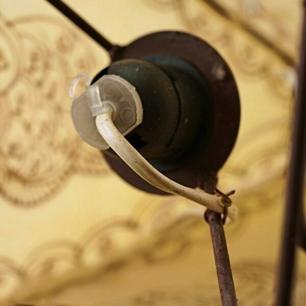 Vintage Ethnic Chandelier In Metal And Leather photo vinterior