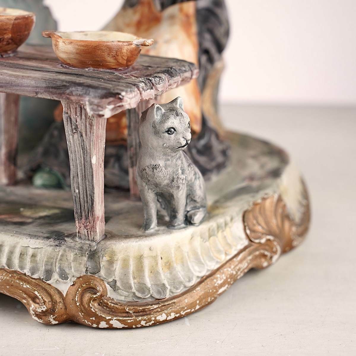Bassano Porcelain Statue Of Elderly Figure With Cat photo furniture