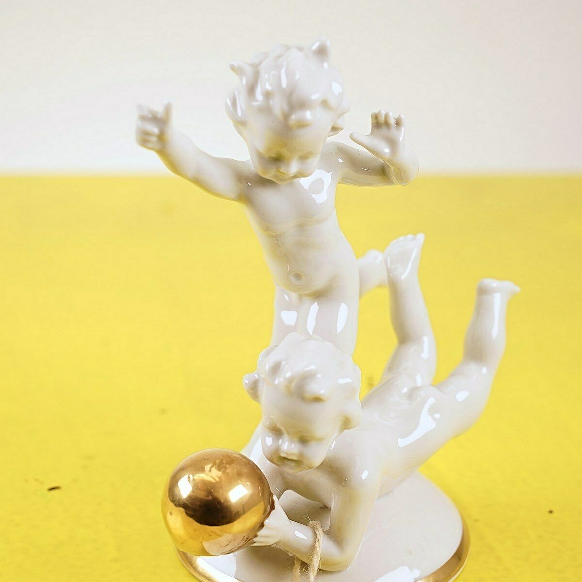 Capodimonte Children's Ceramic Figurine With Gold Ball photo for sale