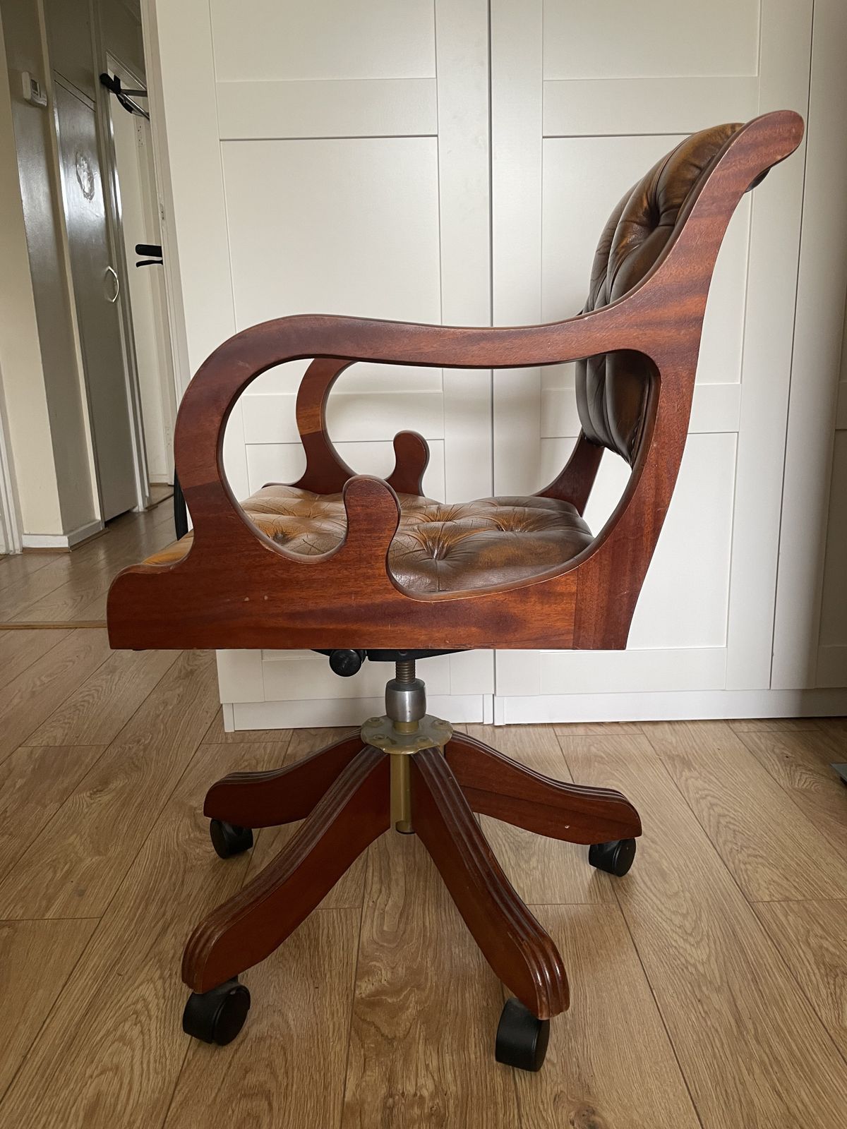 Captain's Wooden Swivel Chair, Embroidered With Leather Upholstery. photo furniture