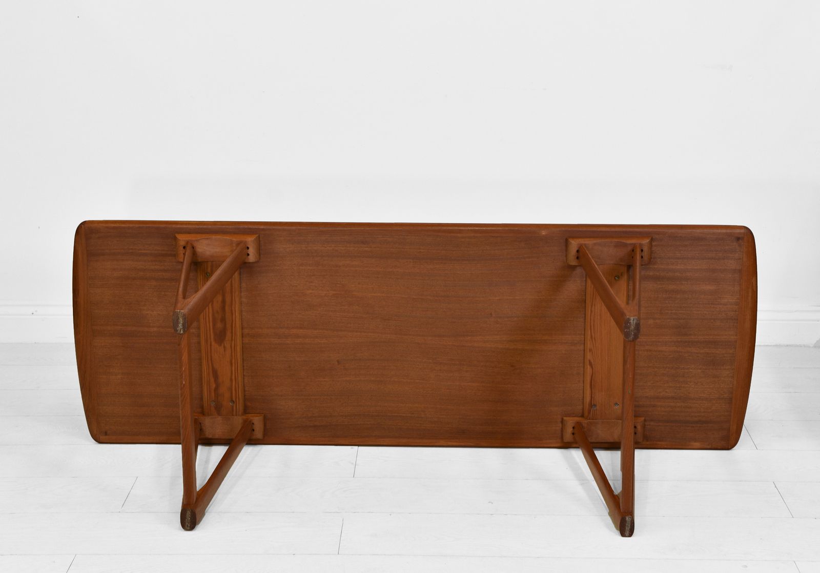 Furniture Mid Century Danish Teak Coffee Table On V Shape Supports And Lipped Top Edge photo