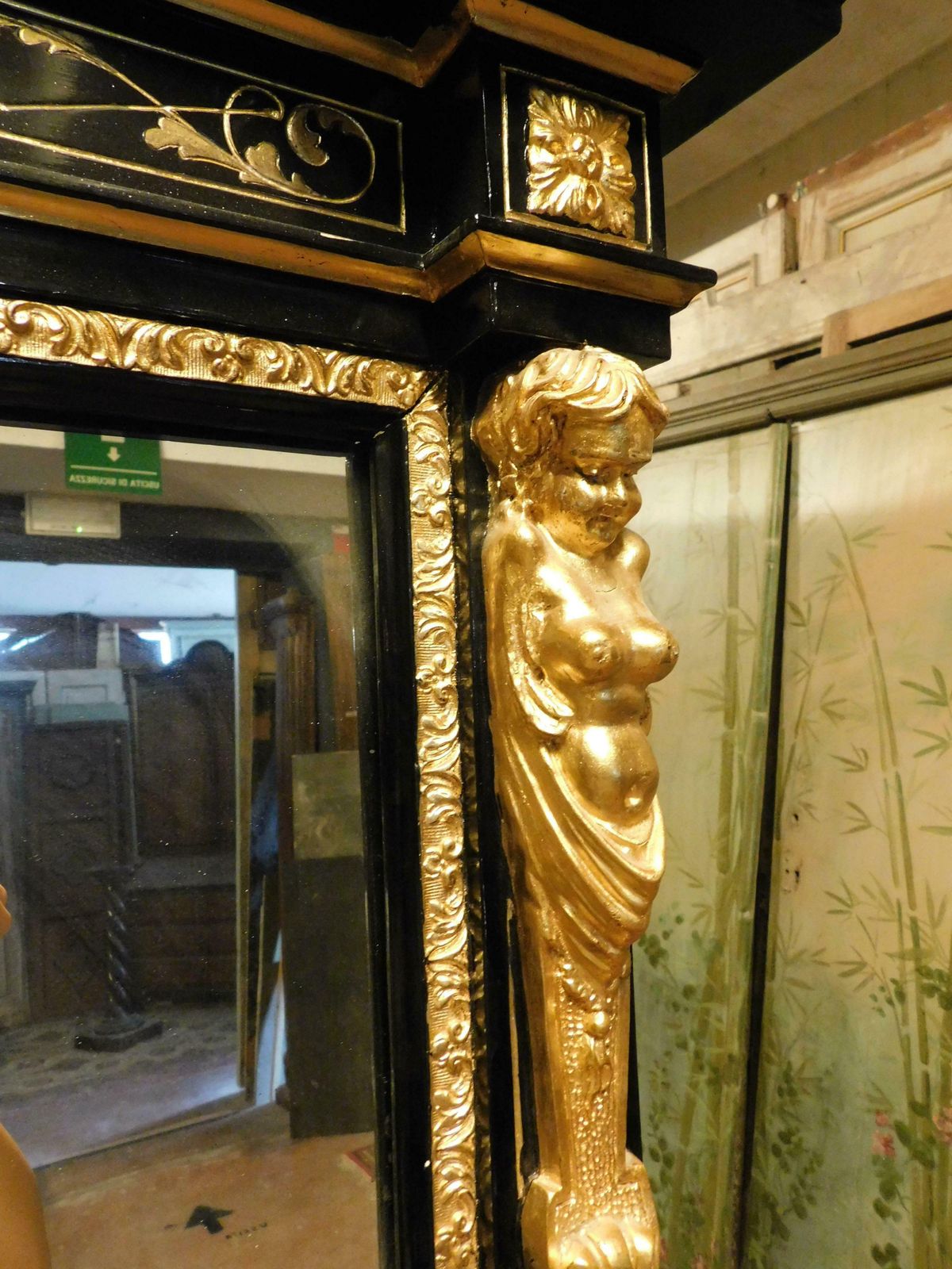 photo furniture Mirror In Black Lacquered Wood, With Rich Golden Sculptures, Italy