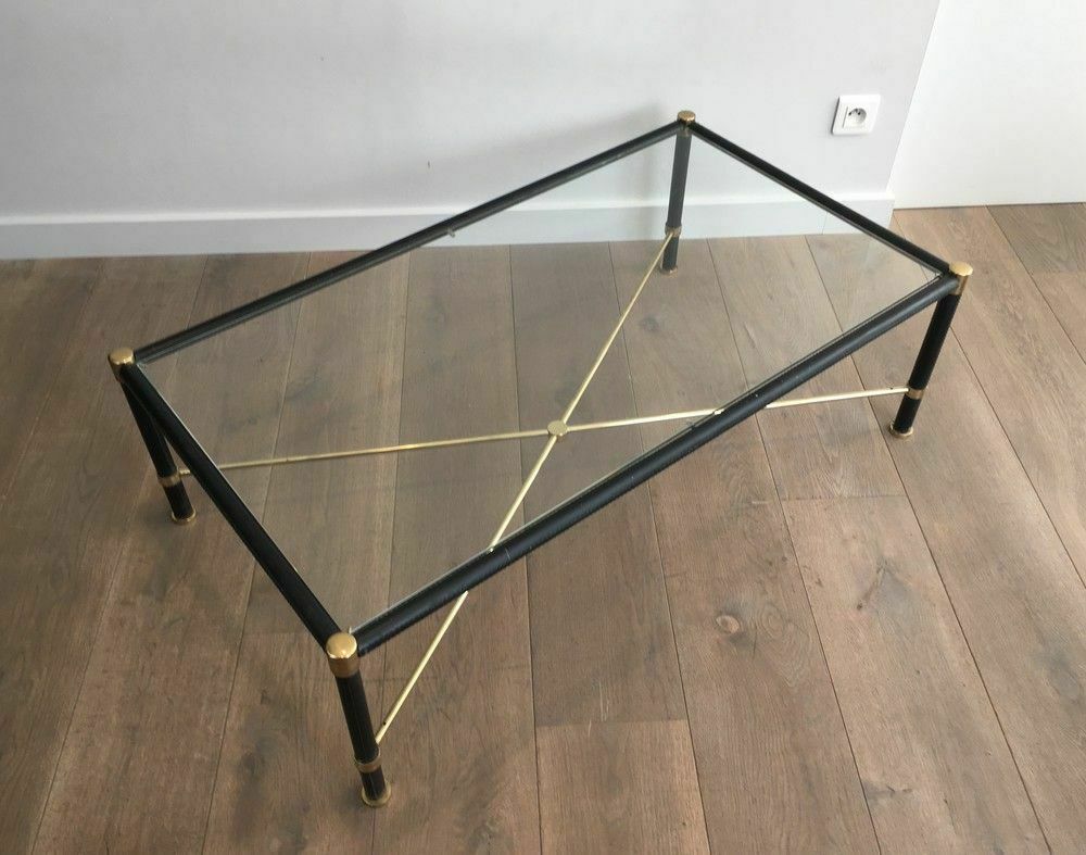 photo furniture Brass Coffee Table Covered In Black Leather. In The Taste Of Jacques Adnet