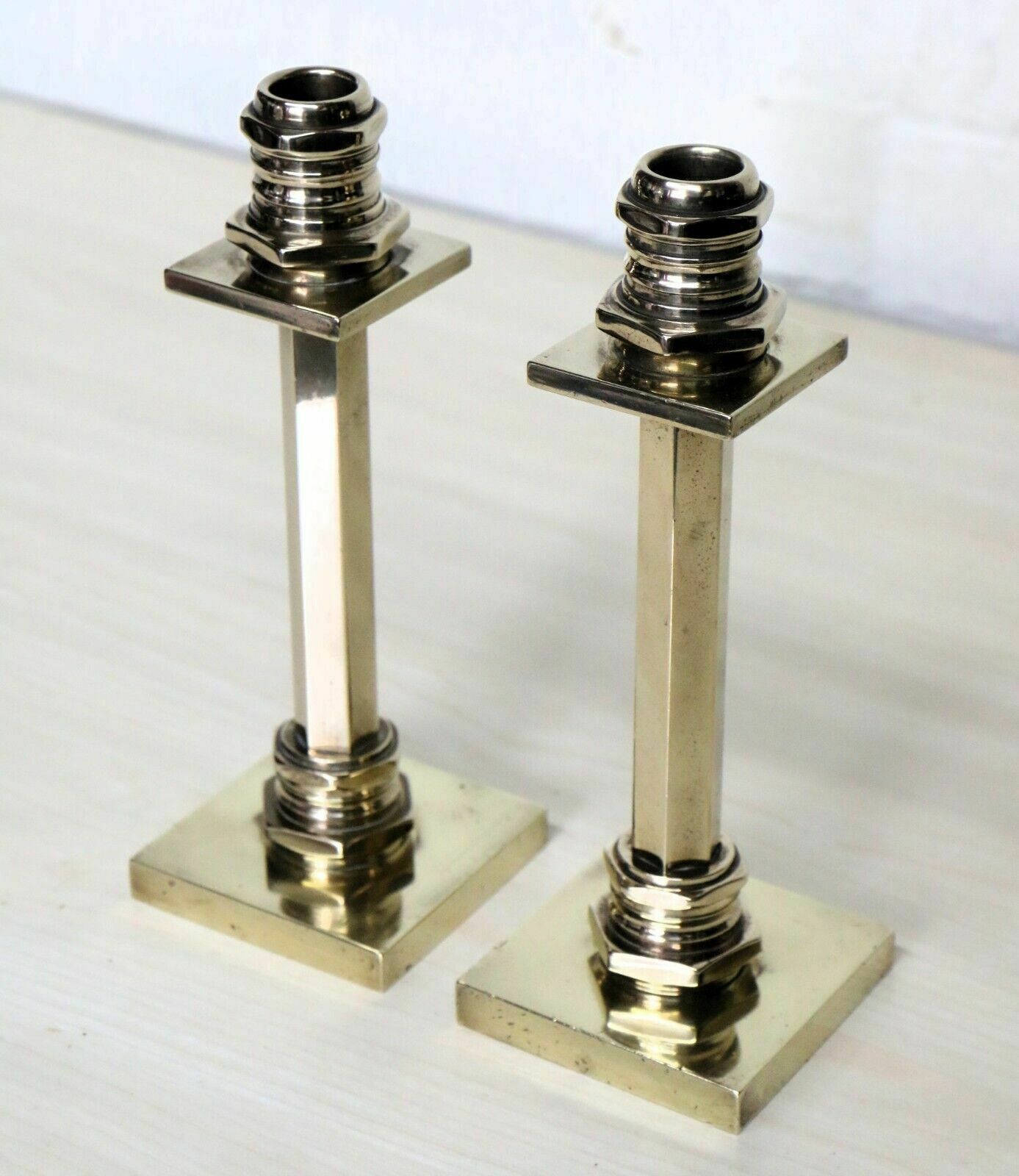 85.0 Candlesticks A Pair Of Art Deco Machine Age Brass Antique Candle Sticks photo
