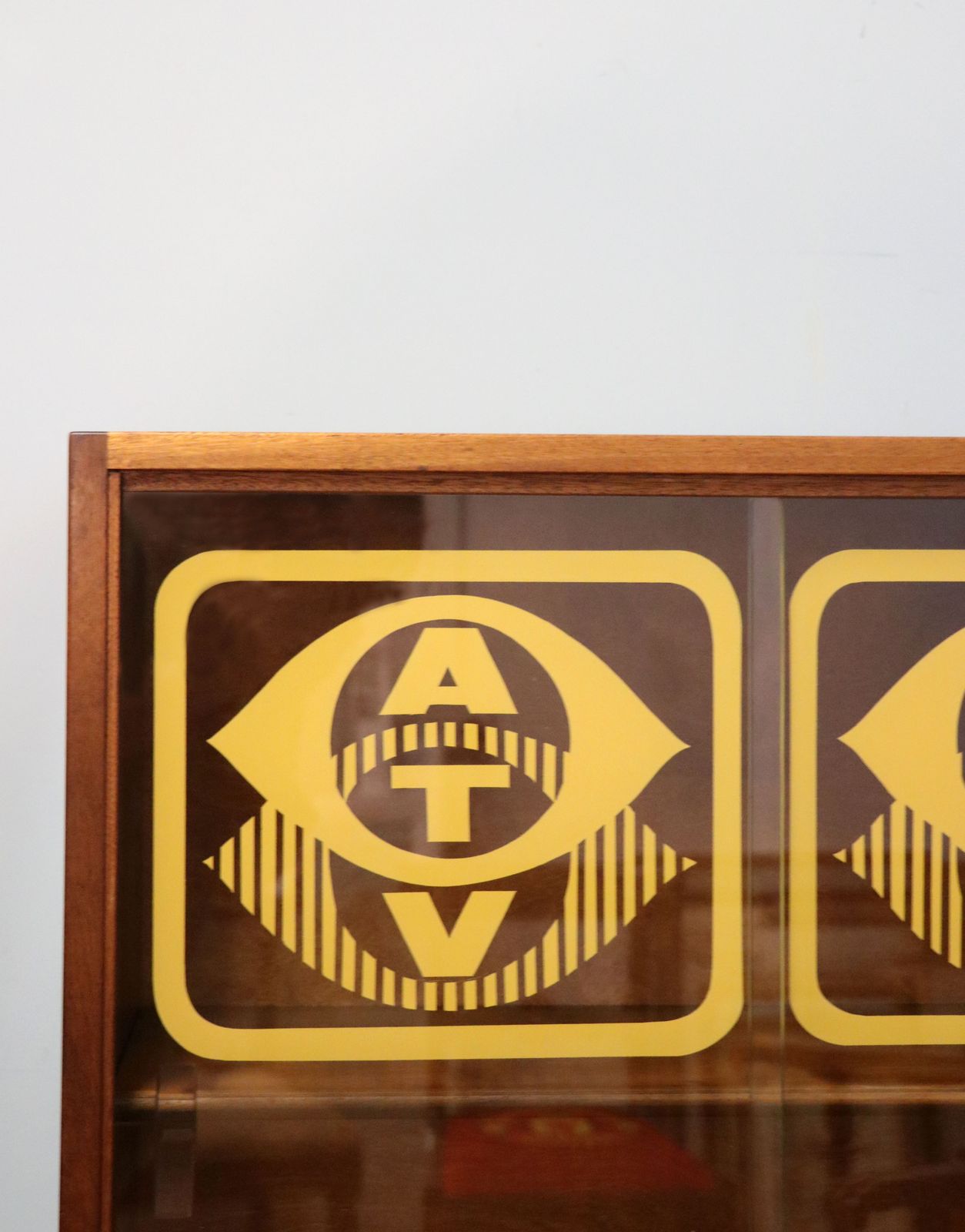 photo vinterior A Lovely Mid Century Display Cabinet Later Sign Written With The Emblems And Wording For Associated Television.