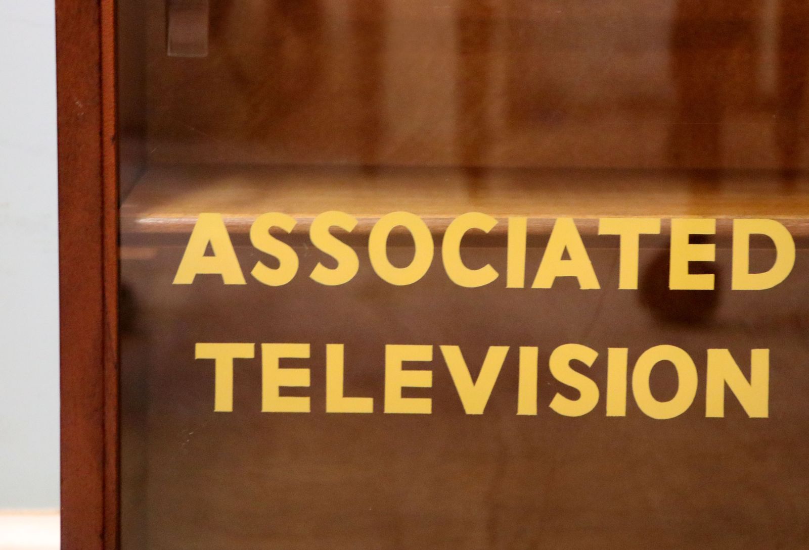 photo buy A Lovely Mid Century Display Cabinet Later Sign Written With The Emblems And Wording For Associated Television.