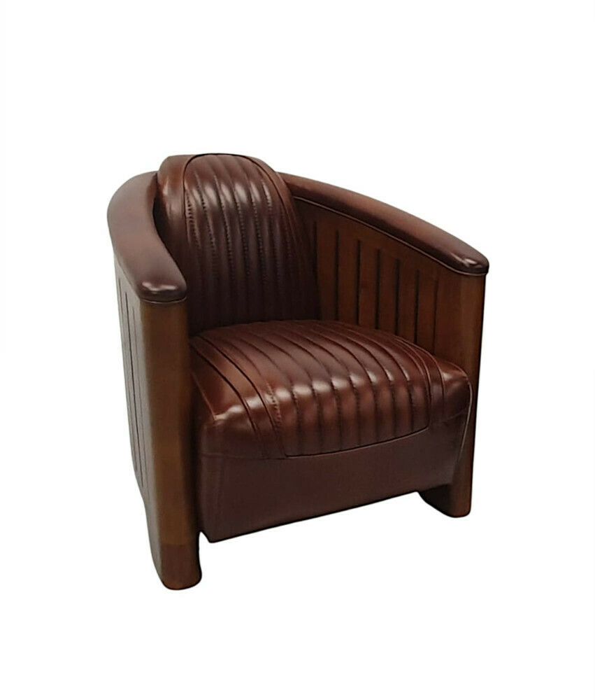 A Stunning Club Armchair In The Art Deco Style