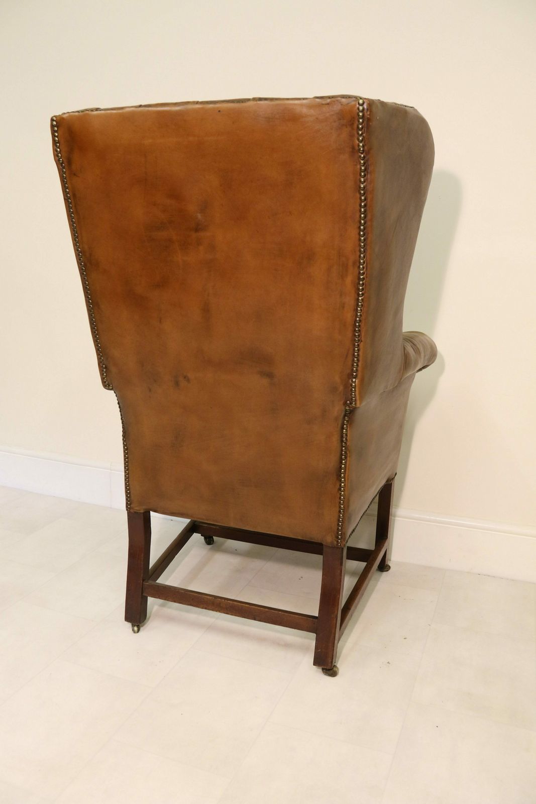 photo for sale A Rare 18th Century Deep Buttoned Leather Wing Backed Arm Chair Circa 1770
