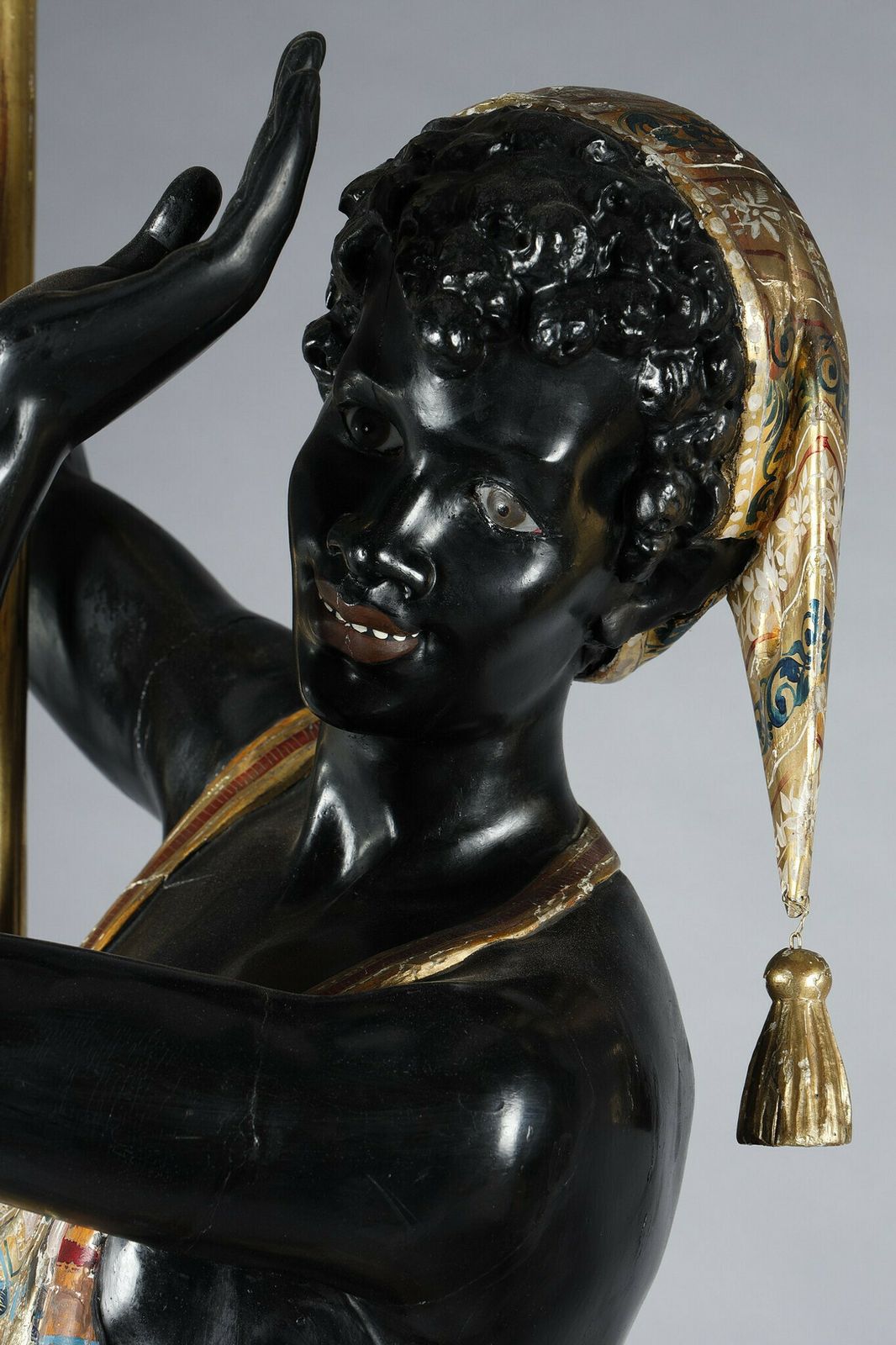 photo for sale Pair Of Black And Polychrome Lacquered Wood Torchholders Depicting Nubians