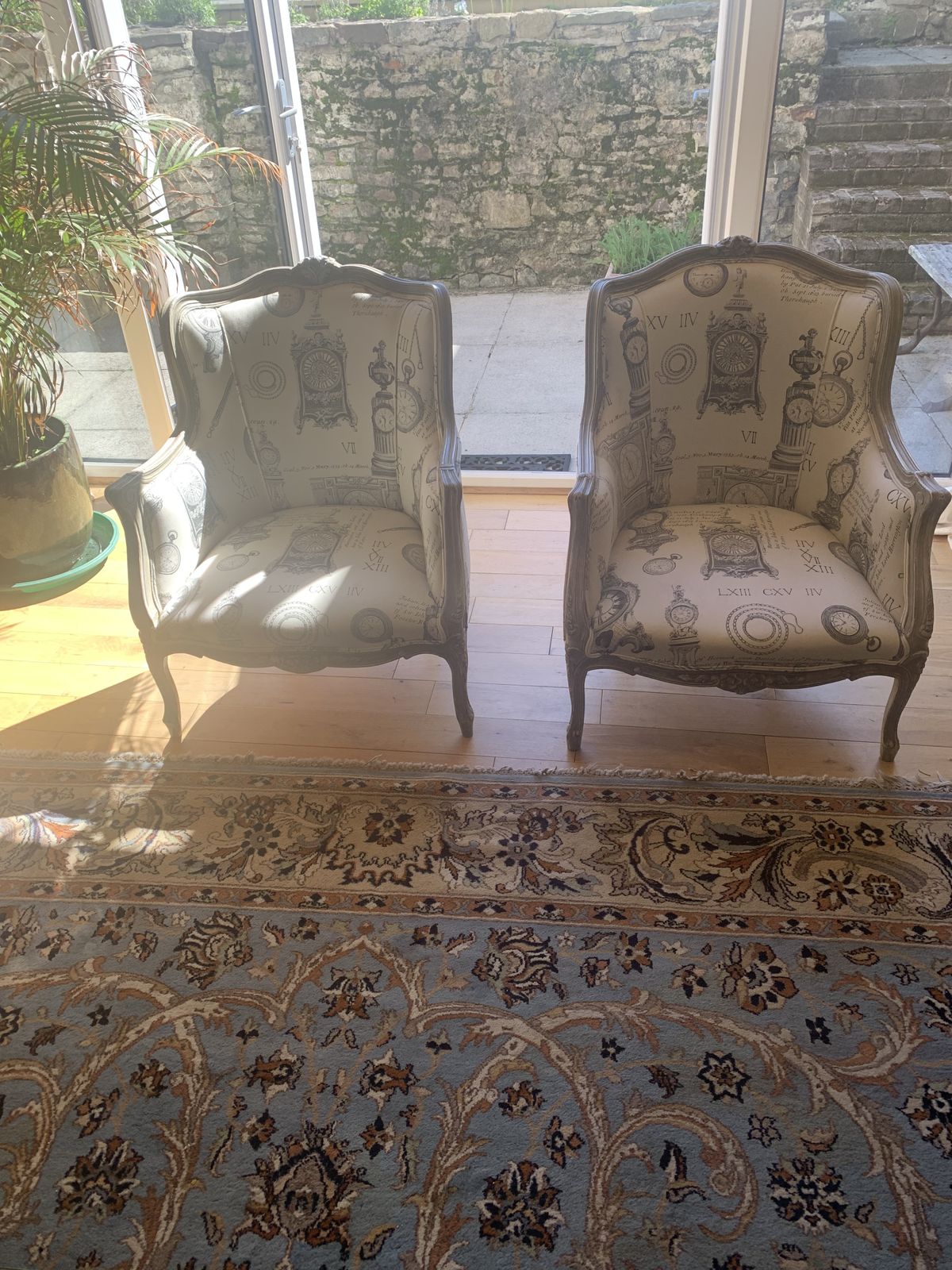 A Pair Of Laura Ashley Bergere Style Arm Chairs