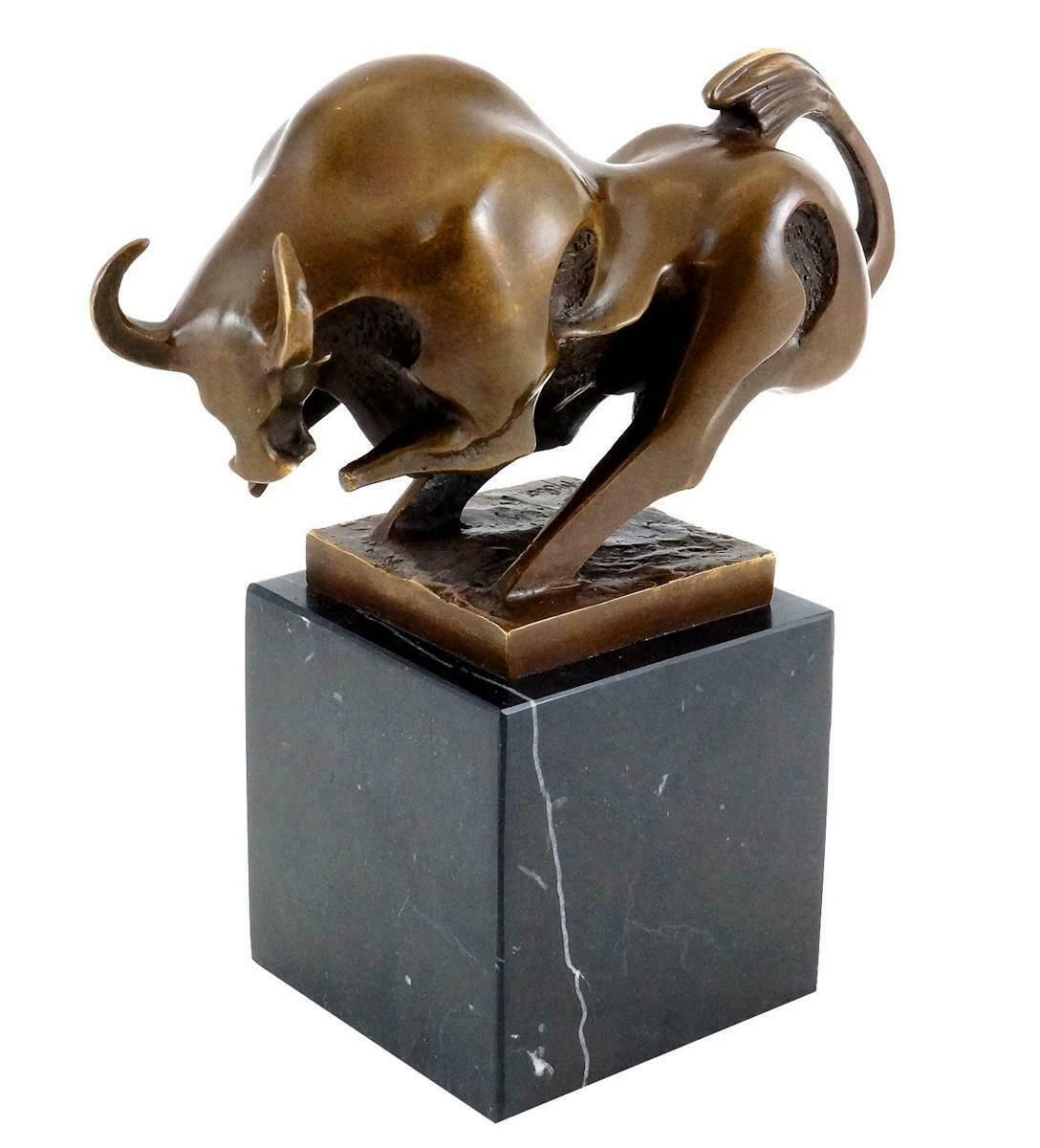 Bronze Sculpture Of A Bull In Motion, 20th Century. photo for sale
