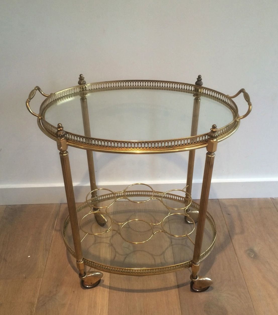 Oval Brass Rolling Table In The Style Of Maison Jansen. Around 1940 photo furniture