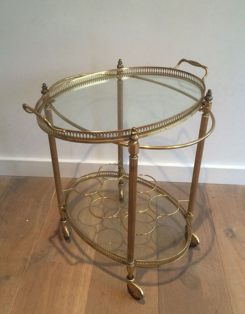 Oval Brass Rolling Table In The Style Of Maison Jansen. Around 1940 photo for sale