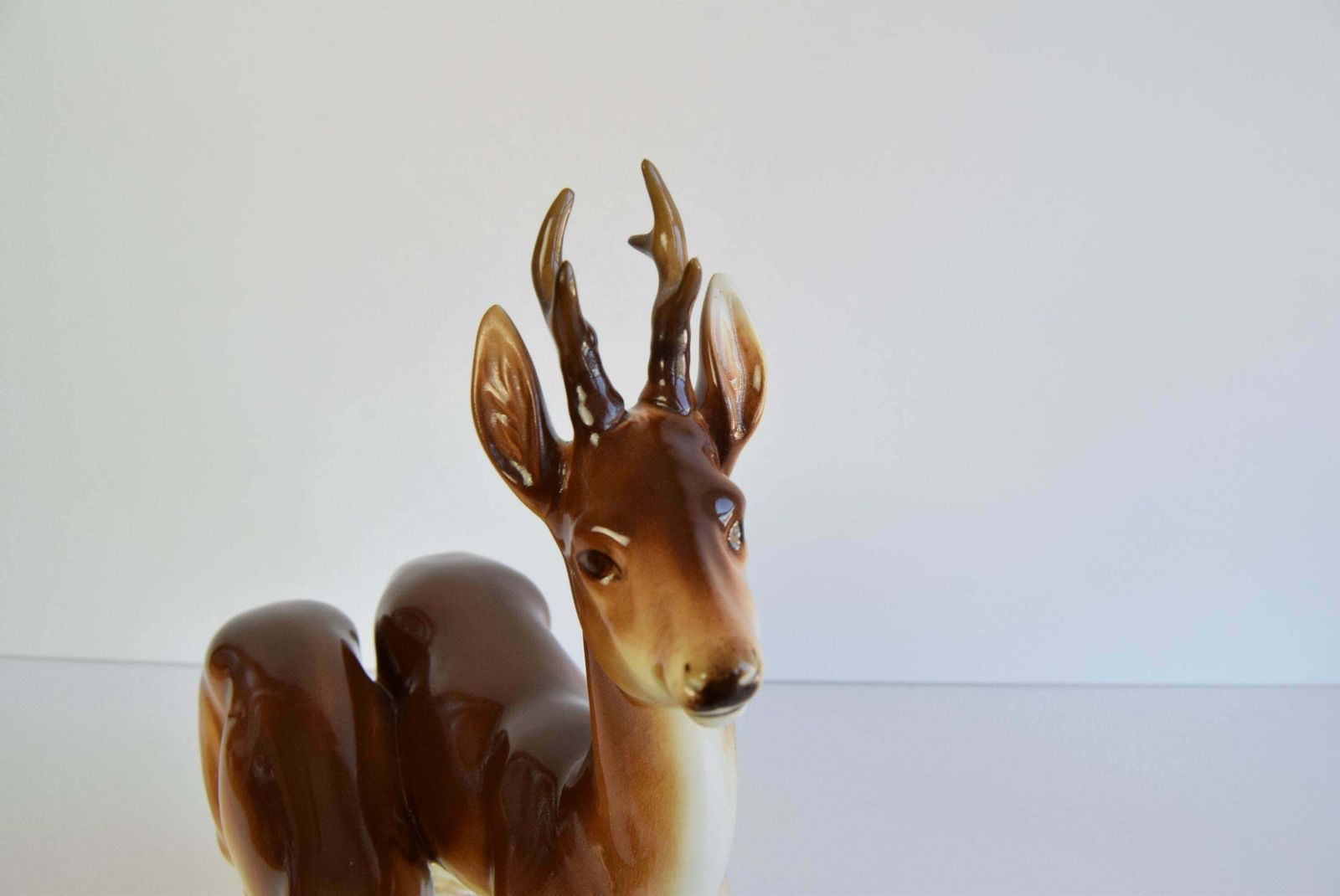 photo for sale Porcelain Deer And Doe Sculpture By Royal Dux, Circa 1950's.