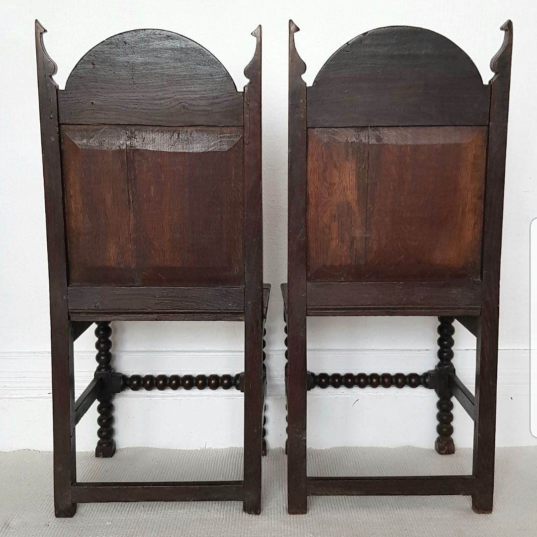 1600.0 A Pair Of 16th Century Carved Oak Hall Chairs. photo