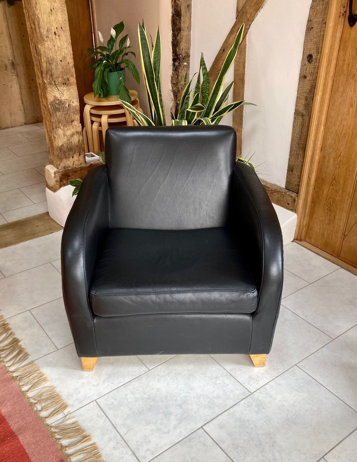 Black Leather Club Chair From Heals By Designer Roger Lewis photo furniture