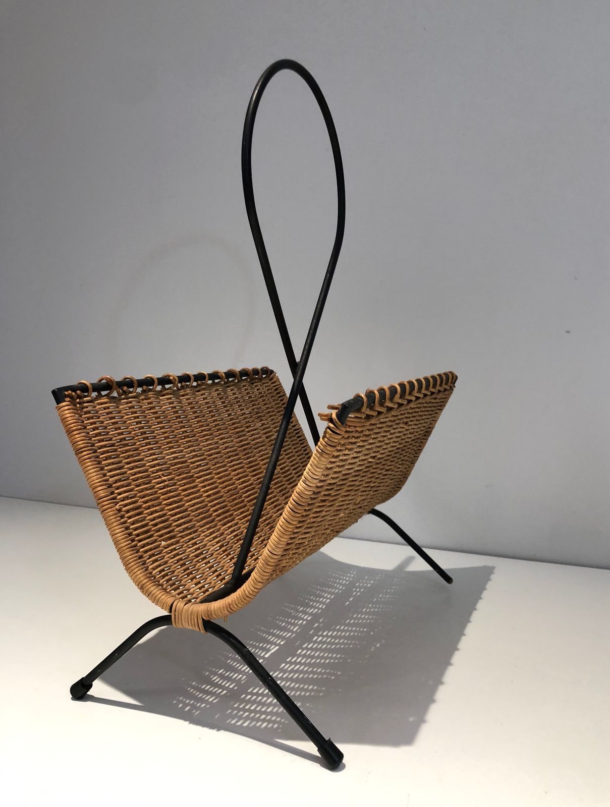Rattan And Black Lacquered Metal Magazine Rack photo furniture