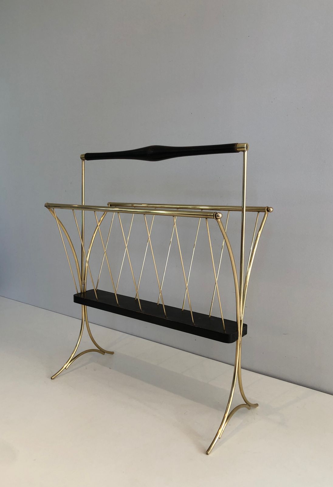 Magazine Rack In Blackened Wood And Brass photo furniture