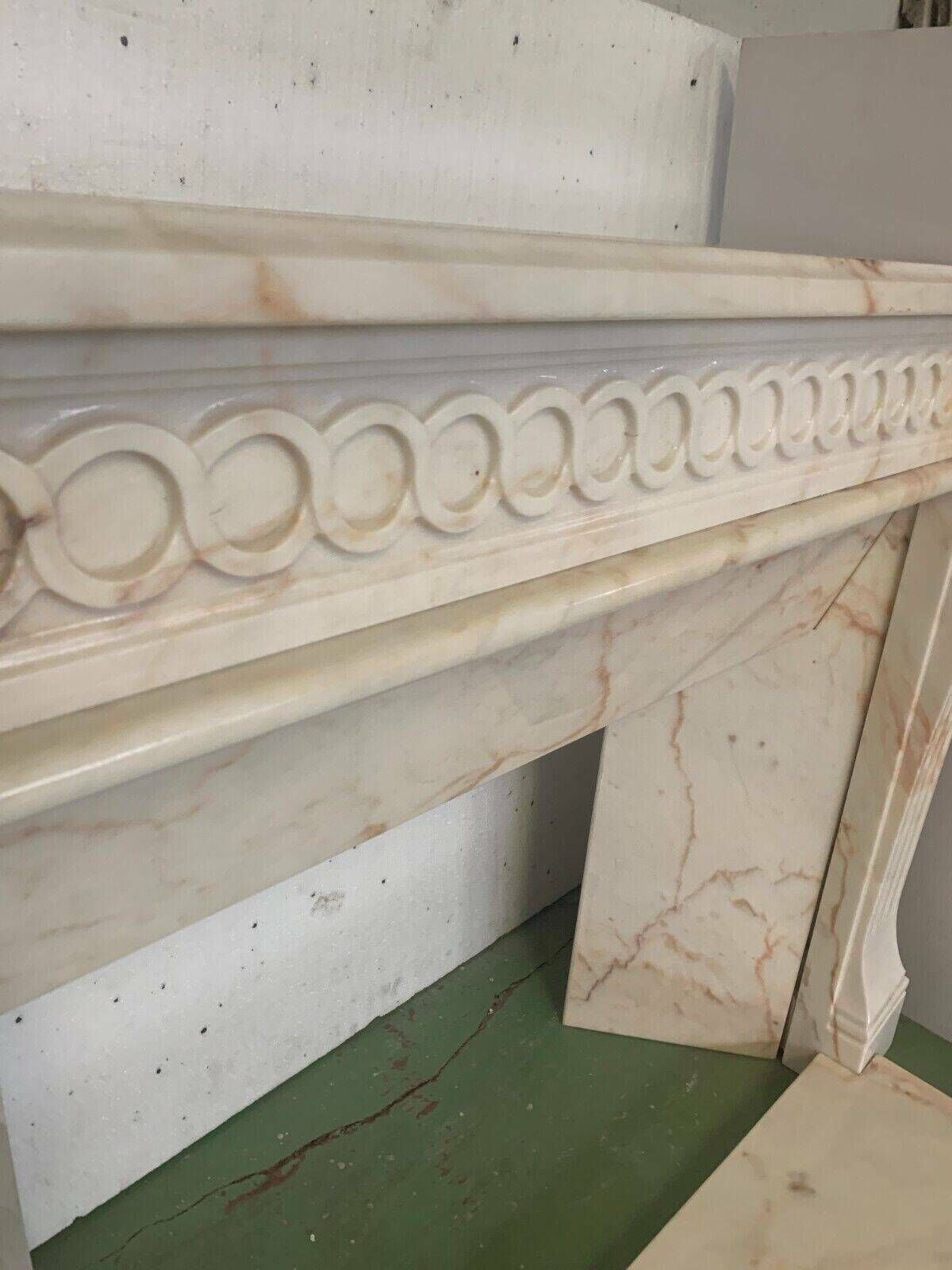 photo buy Louis XVI Style Fireplace In Pink Veined Marble XX Century