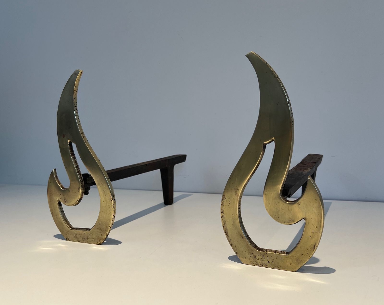 Pair Of Flame Andirons In Brass photo 980.0