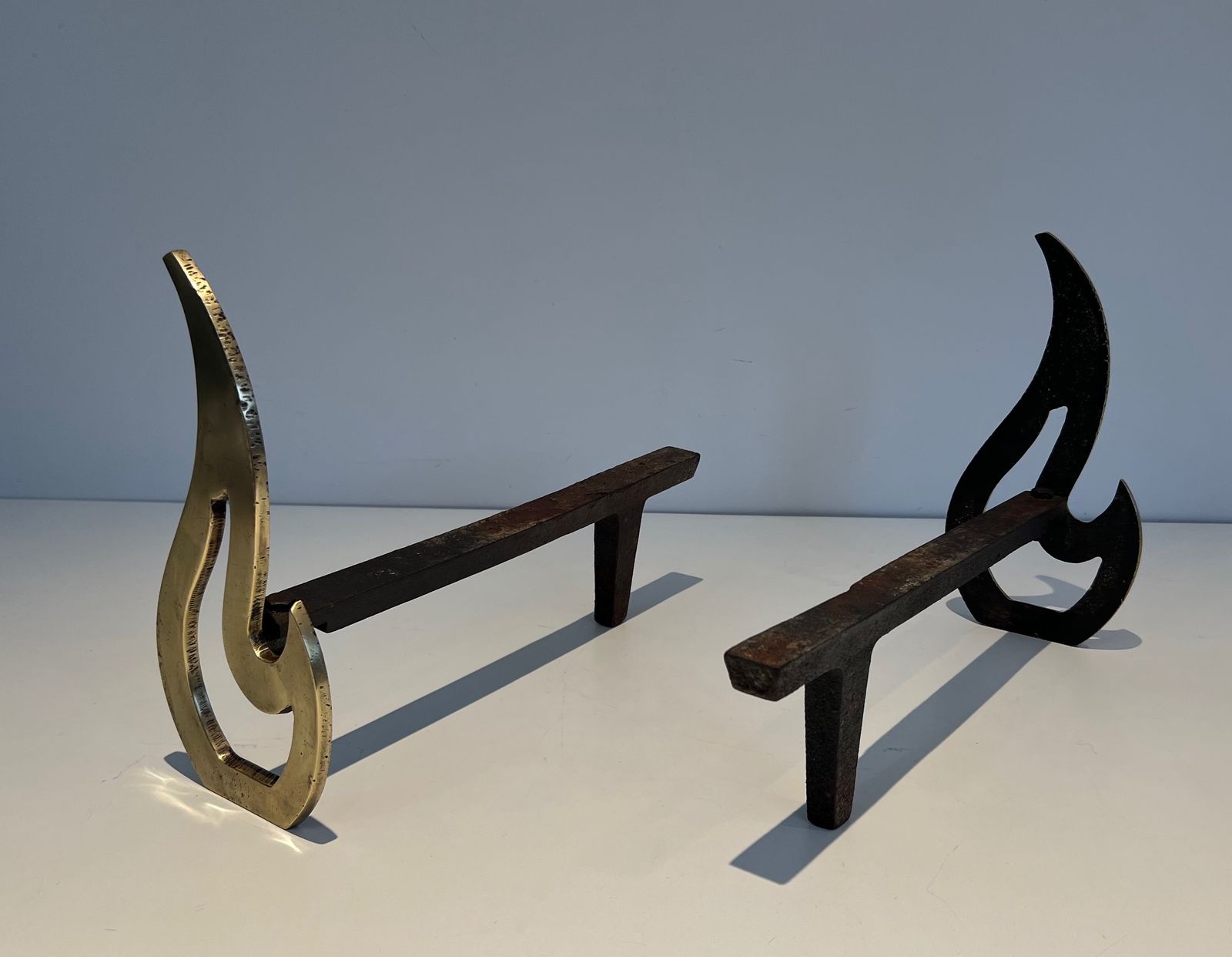 Pair Of Flame Andirons In Brass photo vinterior