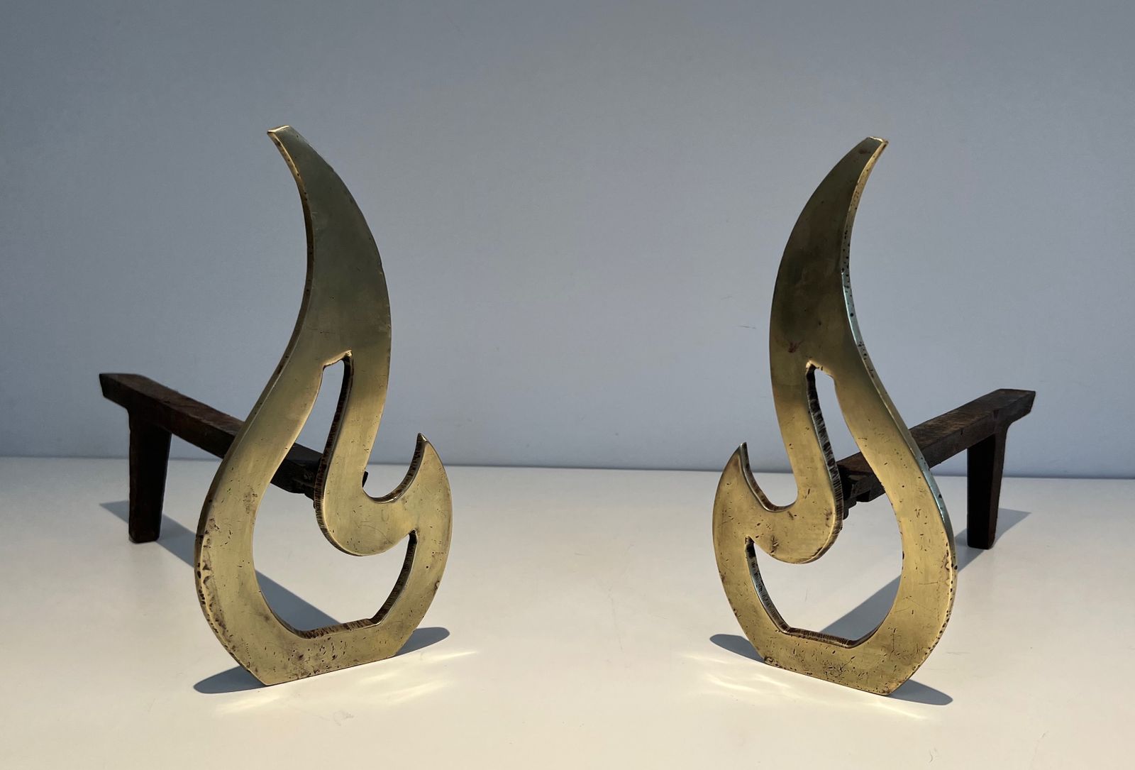 Home Fixtures Pair Of Flame Andirons In Brass photo